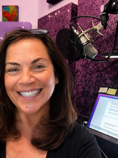 Melanie Katz in her studio at the microphone